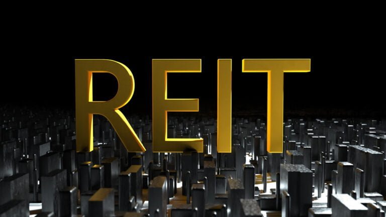 Iniciály REIT jako zkratka pro realitní investiční fondy, investice do realit