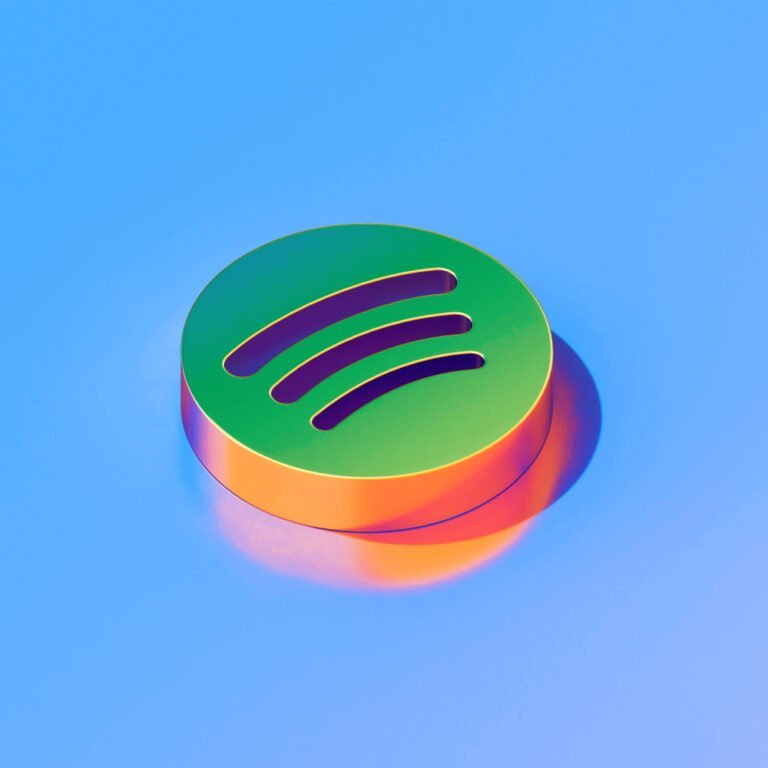 Ikona platformy Spotify na lesklém modrém pozadí, platforma pro streamování zvuku