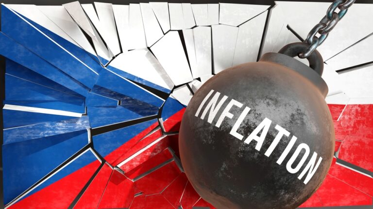 Českou vlajku drží železná koule, která má na sobě nápis INFLATION (inflace)
