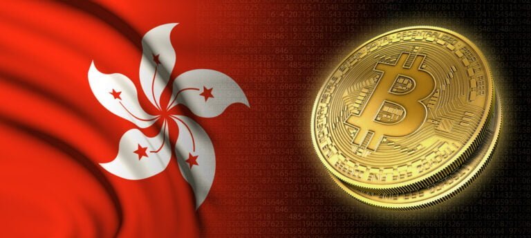 Kryptoměna Bitcoin vedle vlajky Hongkongu